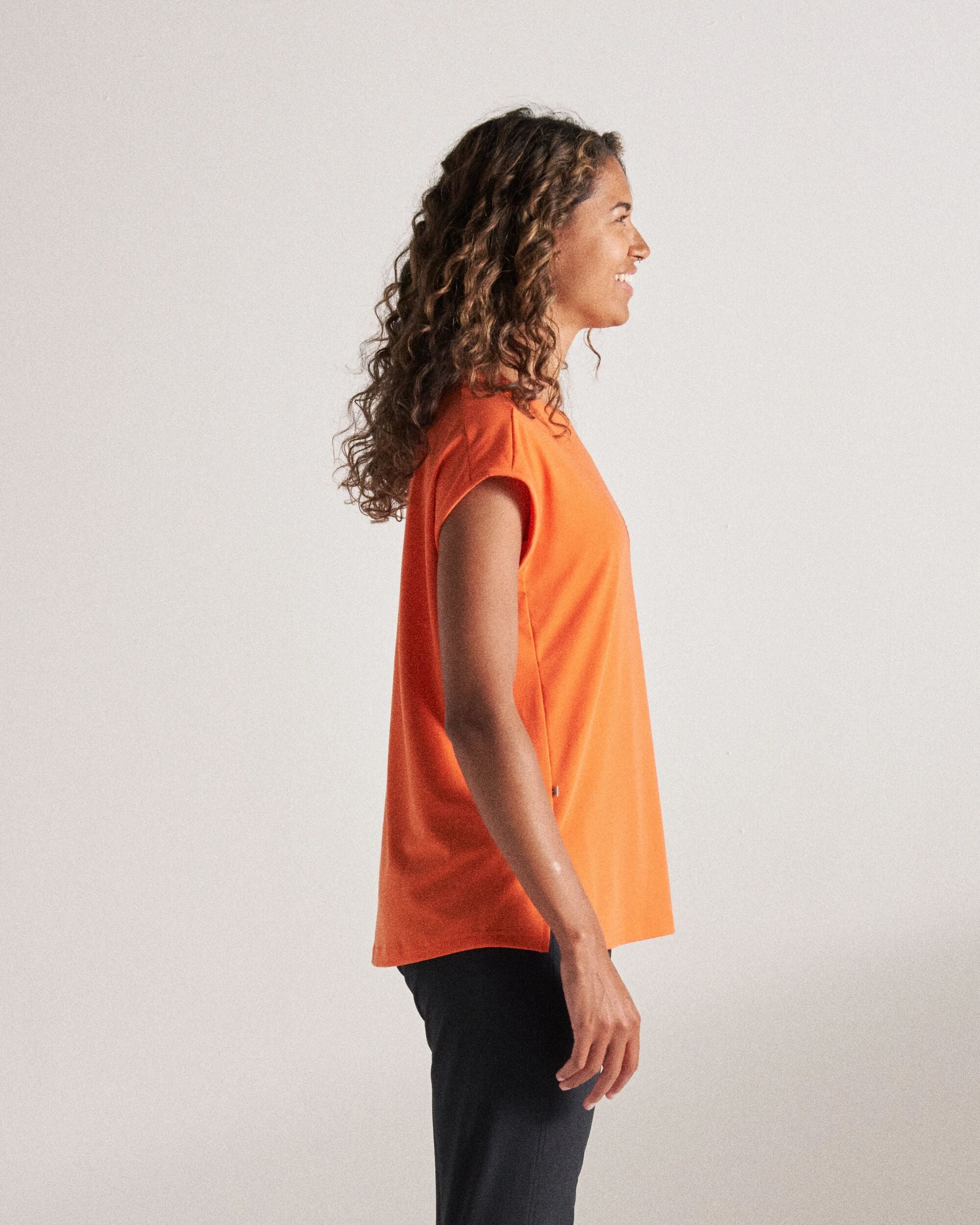 Chase The Light Drirelease® Active T-Shirt - Ember Orange - Studio Model