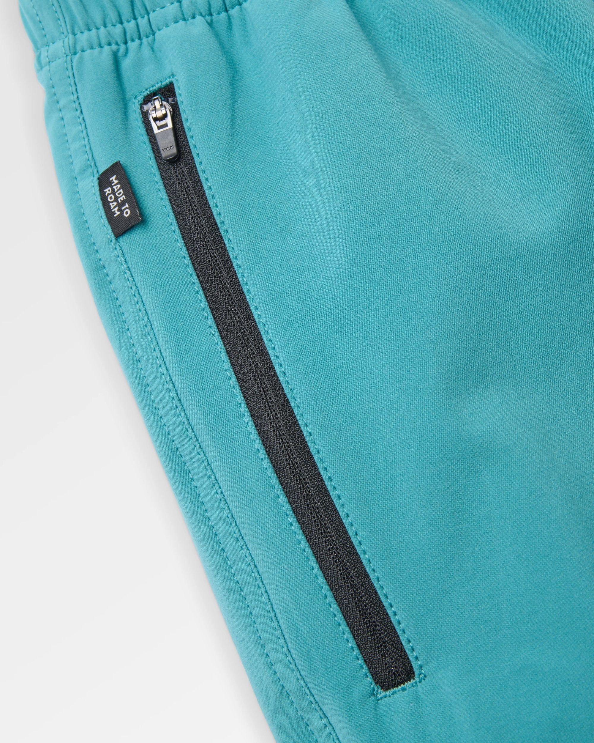 Traveller Organic All Purpose Short 2.0 - Ocean Teal - Flatlay