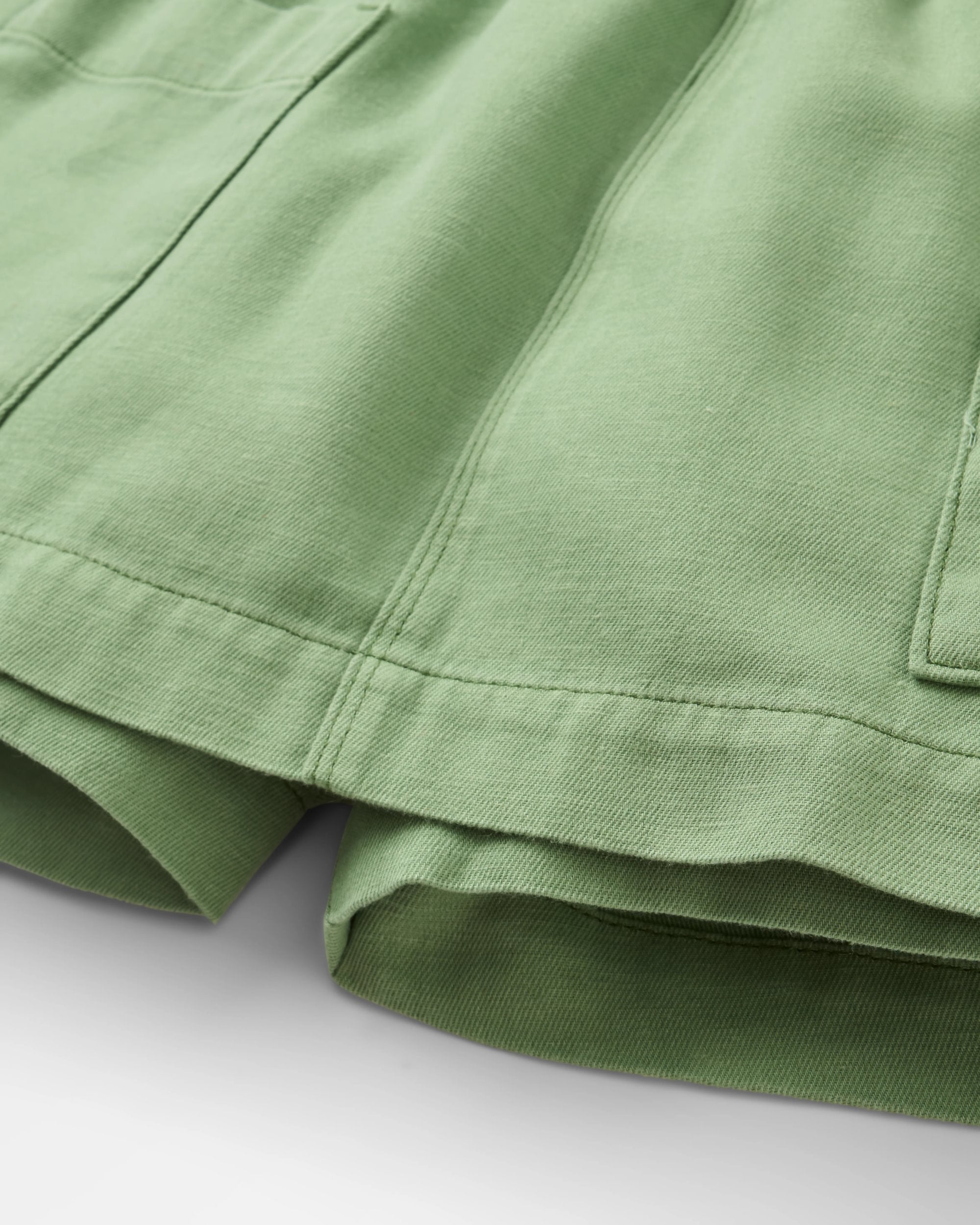 Whirl Lightweight Skort - Stem Green - Flatlay