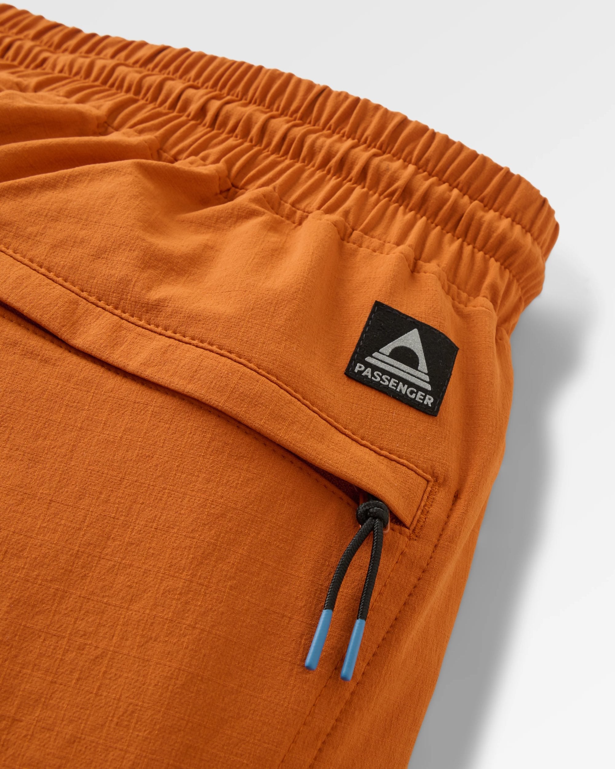 Sandstone Recycled Active Trail Jogger - Sunset Orange - Flatlay