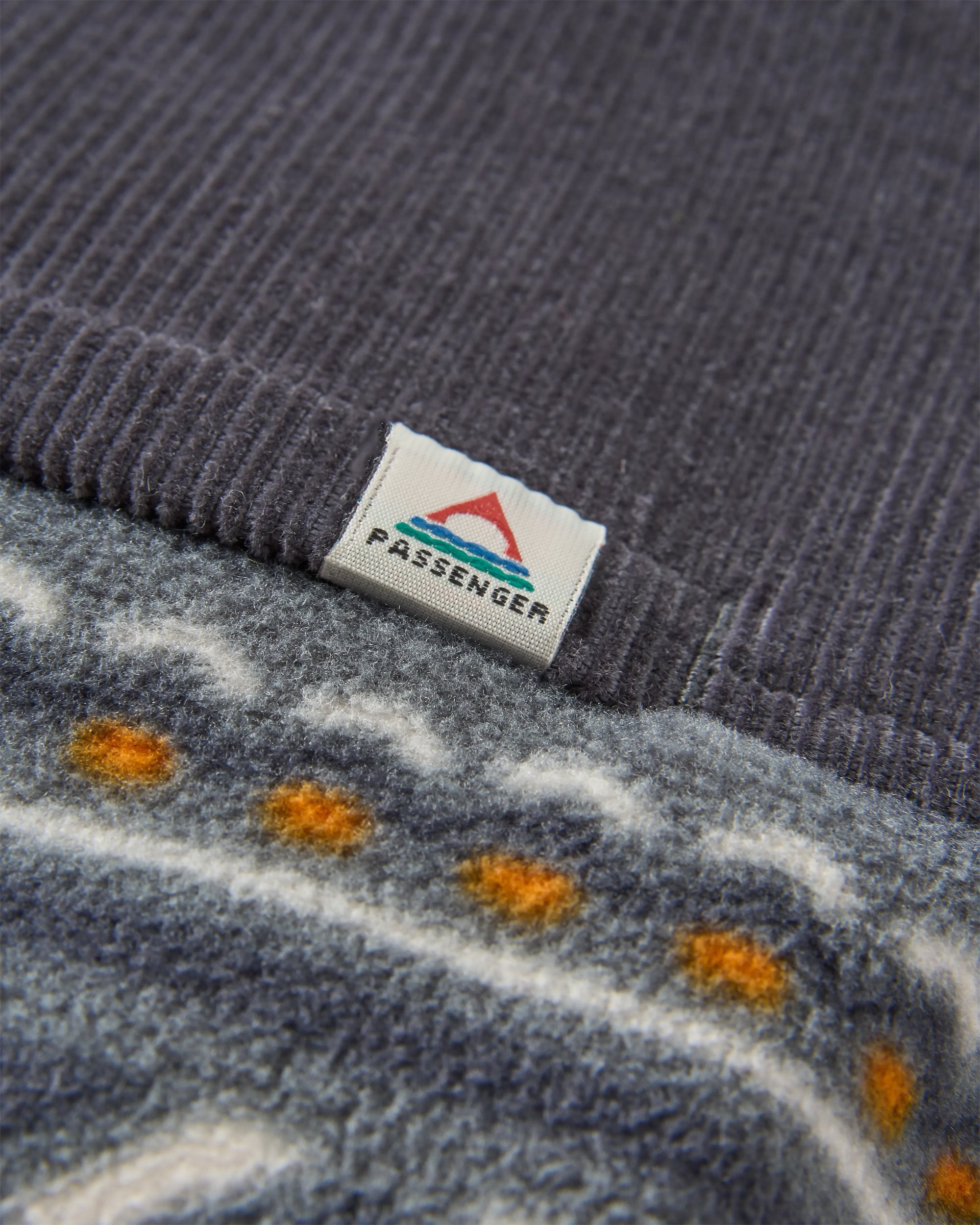 Somewhere Recycled Fleece - Geo Tracks Charcoal - Flatlay