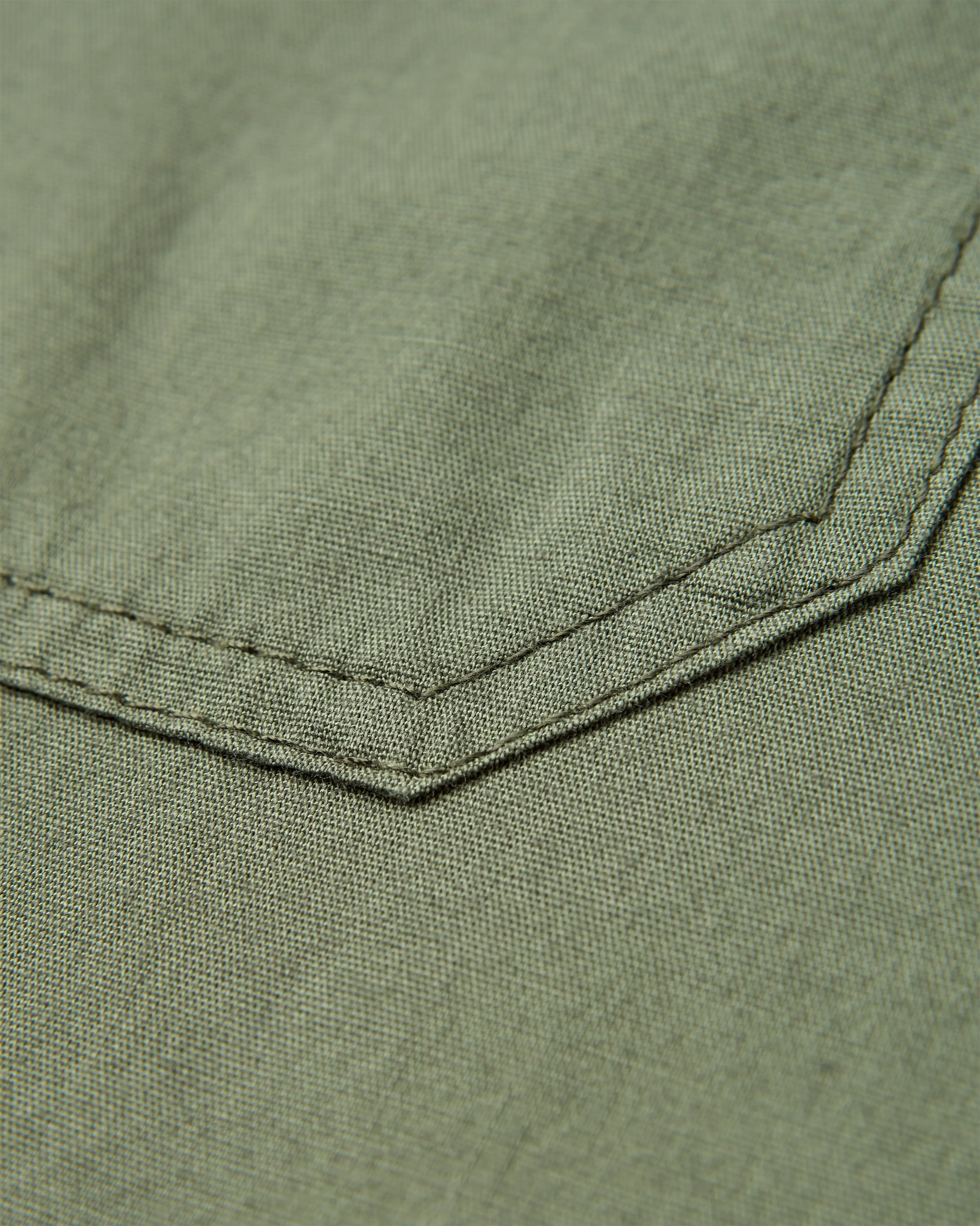 Talis Light Casual Trouser - Wild Green - Flatlay