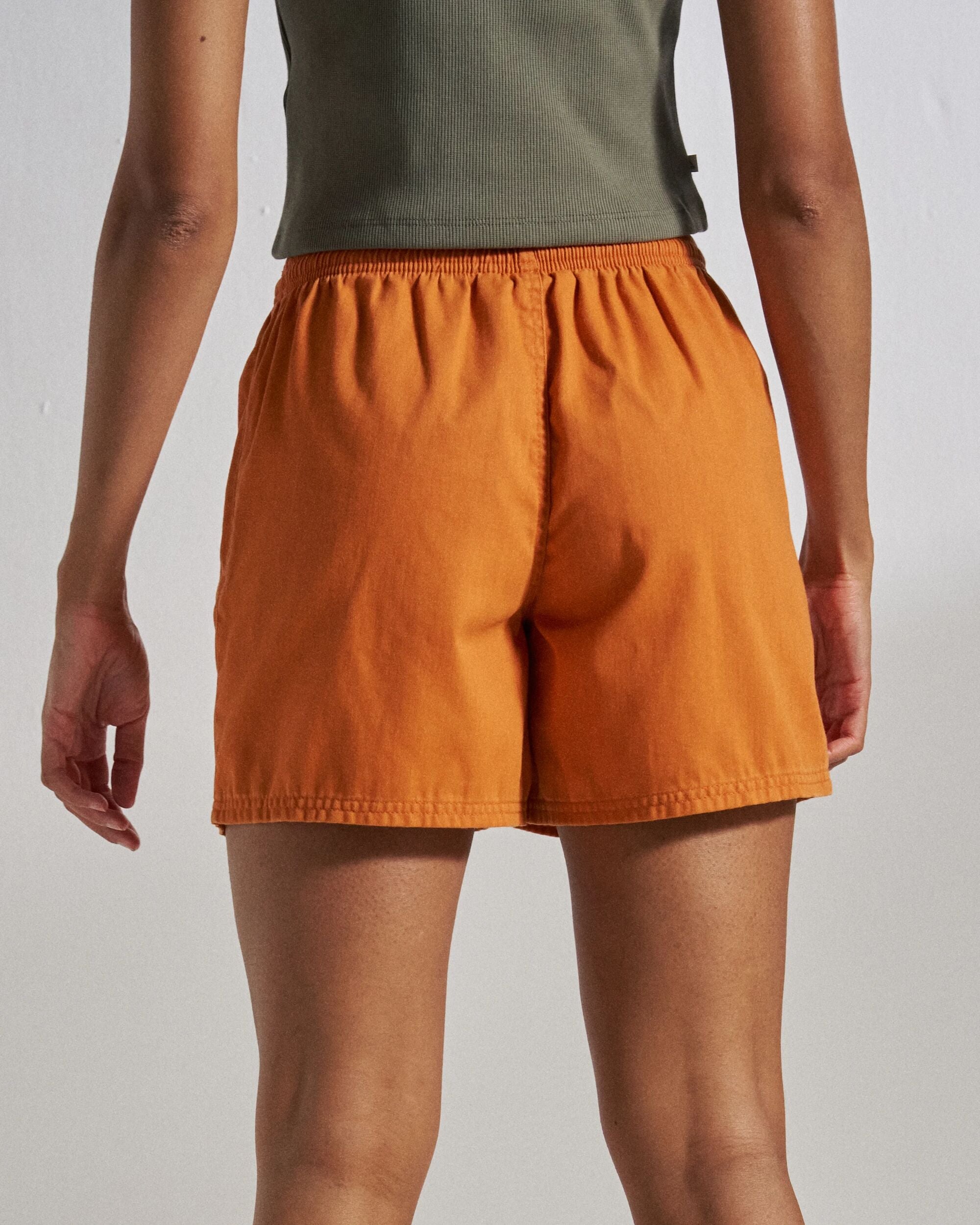 Flaris All Purpose Short - Sunrise Orange - Studio Model