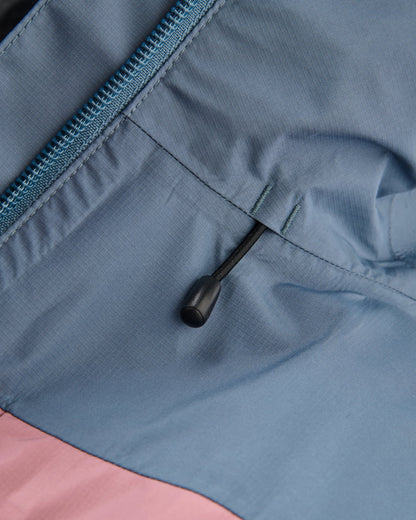 Trailscape Women's Waterproof Jacket - Stormy Blue/Pistachio - Flatlay